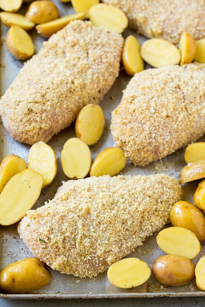 Italian Chicken Recipe | Sheet Pan Chicken | Baked Chicken #chicken #potatoes #dinner #jonep Breaded Italian chicken and potatoes on a sheet pan.