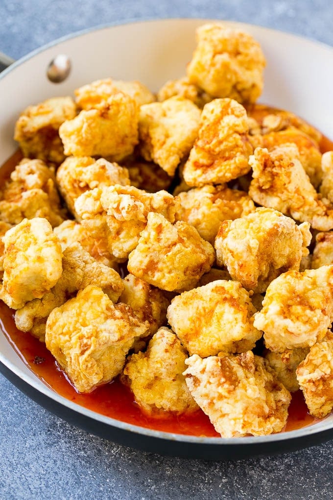 Sweet Chili Chicken Recipe | Thai Chicken | Asian Chicken #chicken #thaifood #chili #dinner #jonep Crispy chicken breast pieces with sweet chili sauce in a pan.