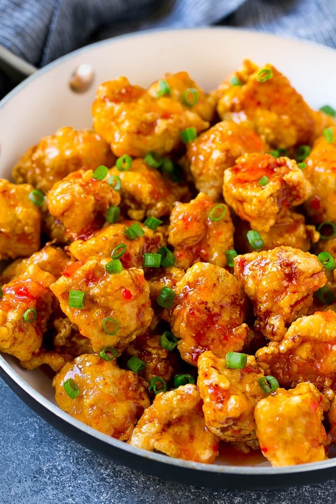 Sweet Chili Chicken Recipe | Thai Chicken | Asian Chicken #chicken #thaifood #chili #dinner #jonep Sweet chili chicken in a skillet, topped with sliced green onions.