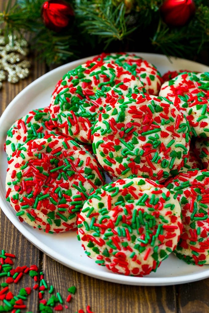 Cake Mix Cookies Recipe | Sprinkle Cookies | Christmas Cookies #cookies #christmas #sprinkles #dessert #baking #jonep A plate of cake mix cookies rolled in colorful sprinkles.