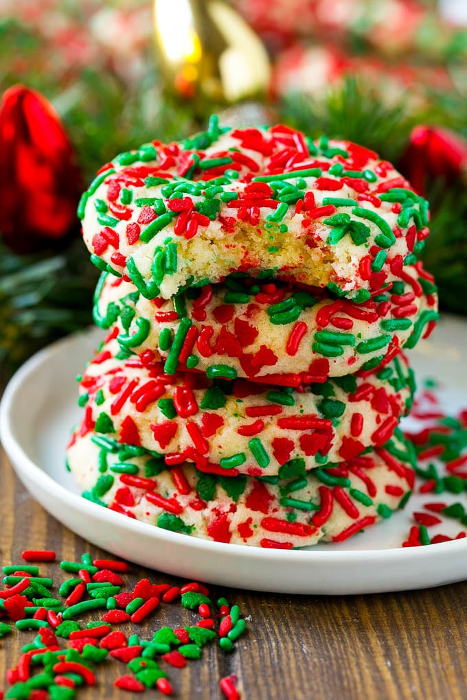 Cake Mix Cookies Recipe | Sprinkle Cookies | Christmas Cookies #cookies #christmas #sprinkles #dessert #baking #jonep A stack of cake mix cookies made with white cake mix and festive sprinkles.