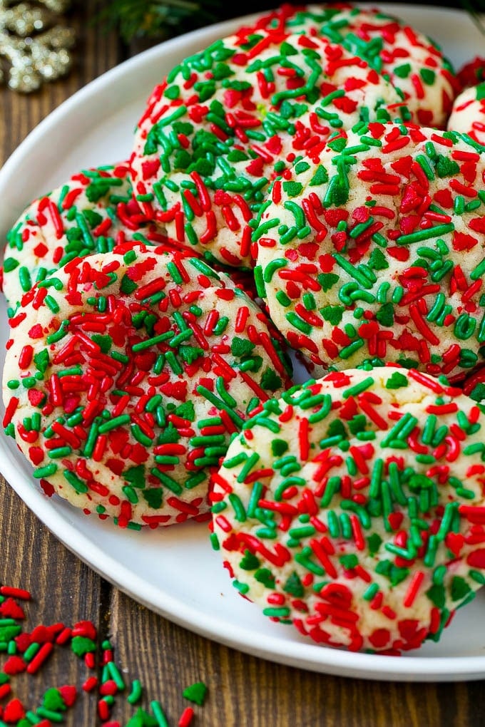 Cake Mix Cookies Recipe | Sprinkle Cookies | Christmas Cookies #cookies #christmas #sprinkles #dessert #baking #jonep Cake mix cookies with sprinkles on a serving plate.