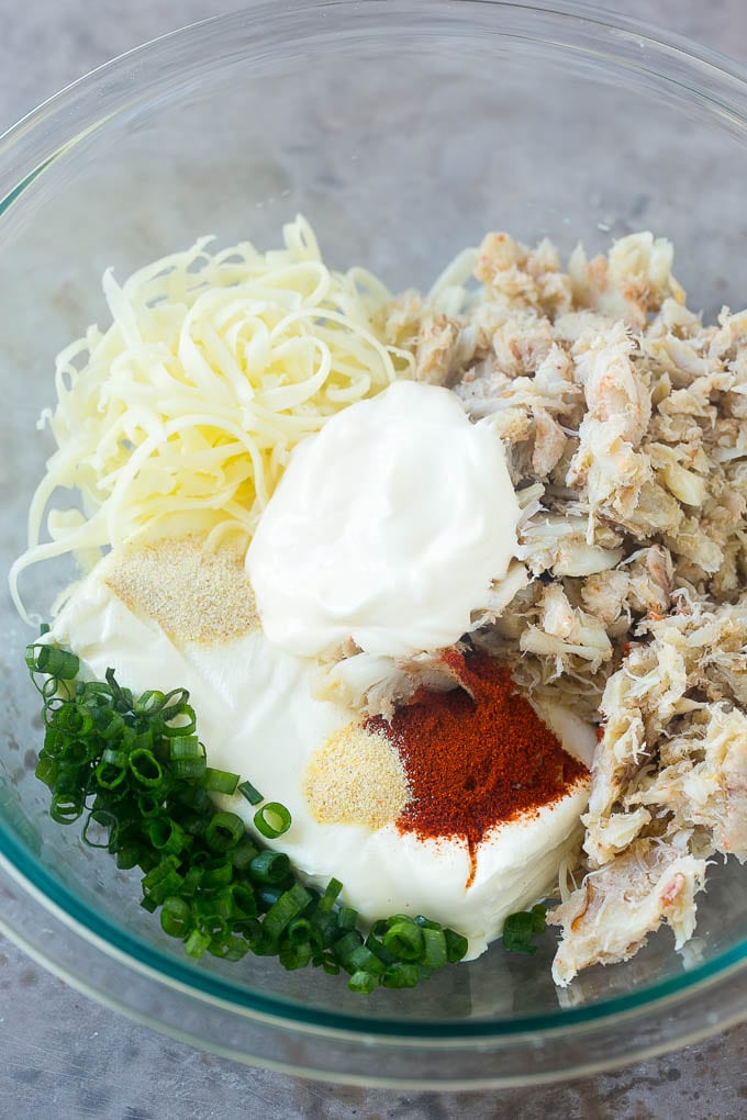 Crab Dip Recipe | Hot Crab Dip | Seafood Dip #dip #crab #seafood #appetizer #jonep #cheese Crab, cream cheese, mayonnaise, green onions and spices in a mixing bowl.