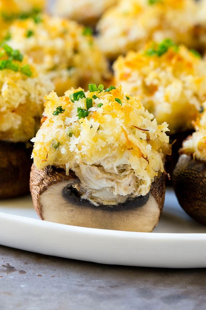 Crab Stuffed Mushrooms Recipe | Stuffed Mushrooms | Mushroom Appetizer #crab #seafood #mushrooms #lowcarb #appetizer #jonep A cross section of a crab stuffed mushroom.