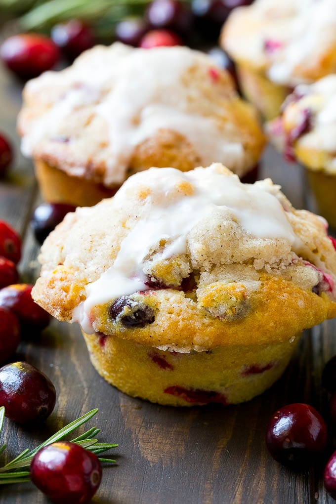 Cranberry Muffins Recipe | Cranberry Orange Muffins #cranberry #muffins #orange #fall #dessert #jonep Cranberry muffins topped with streusel and orange glaze.