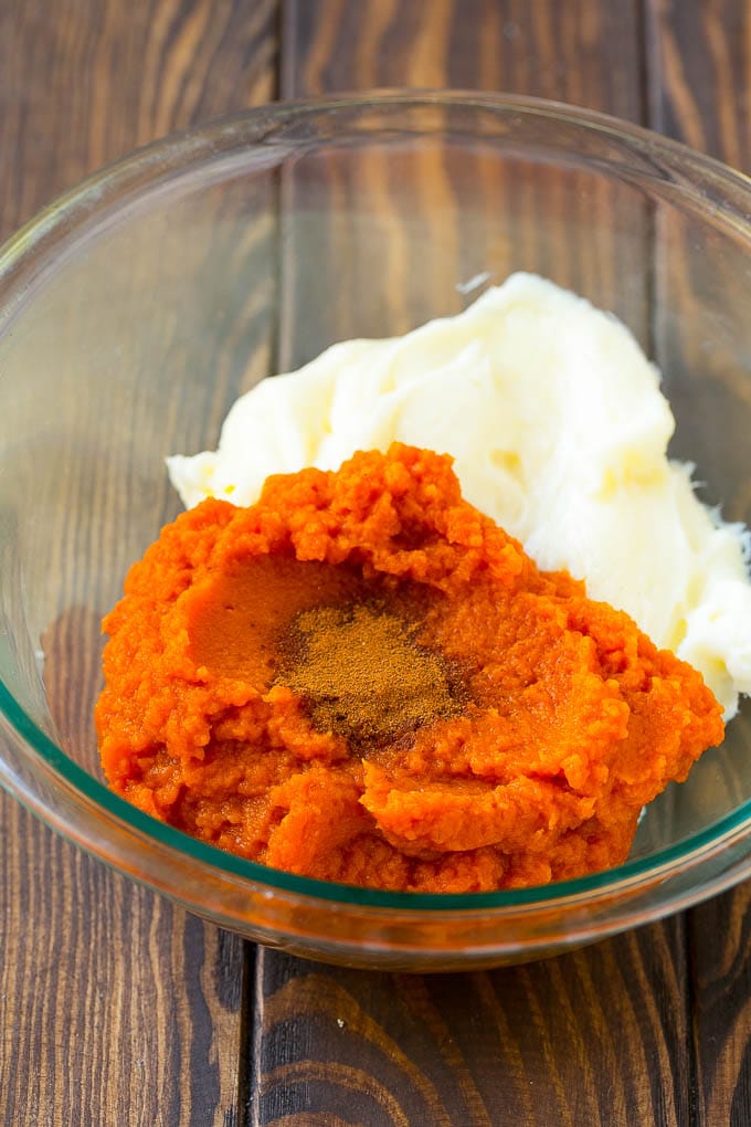 Pumpkin Dip Recipe | Dessert Dip | Pumpkin Pie Dip #pumpkin #dessert #dip #fall #thanksgiving #jonep Puree, cream cheese and spices in a bowl.
