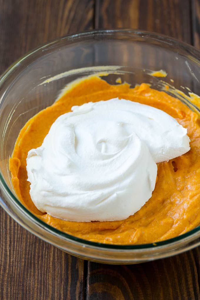 Pumpkin Dip Recipe | Dessert Dip | Pumpkin Pie Dip #pumpkin #dessert #dip #fall #thanksgiving #jonep Cool whip in a bowl with the creamy base.