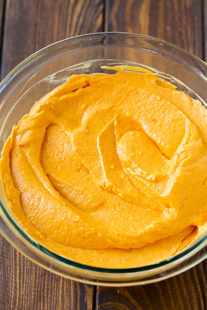 Pumpkin Dip Recipe | Dessert Dip | Pumpkin Pie Dip #pumpkin #dessert #dip #fall #thanksgiving #jonep A bowl of fluffy pumpkin dip.