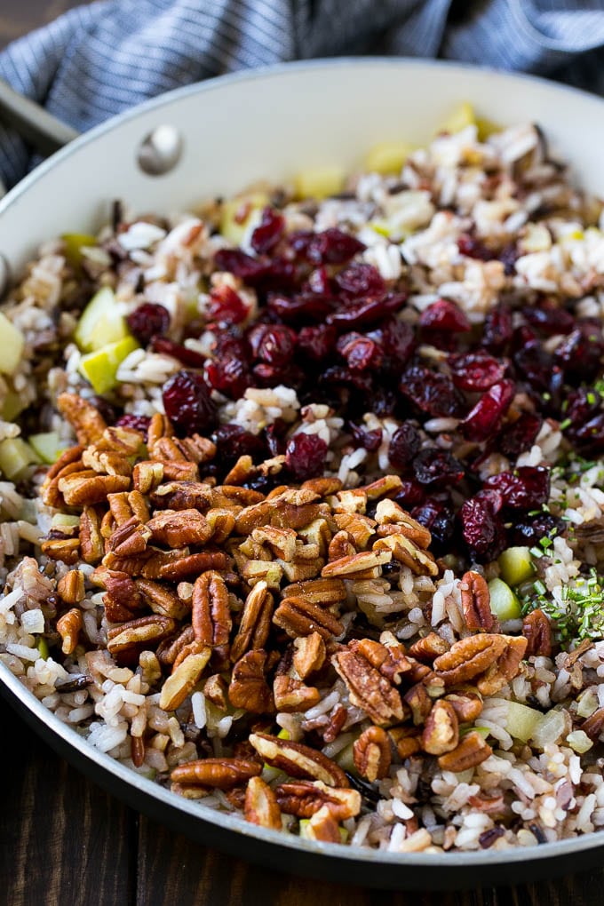 Wild Rice Pilaf Recipe | Thanksgiving Side Dish | Rice Pilaf #rice #apple #cranberry #fall #glutenfree #thanksgiving #jonep Apples and wild rice topped with dried cranberries, pecans and herbs.