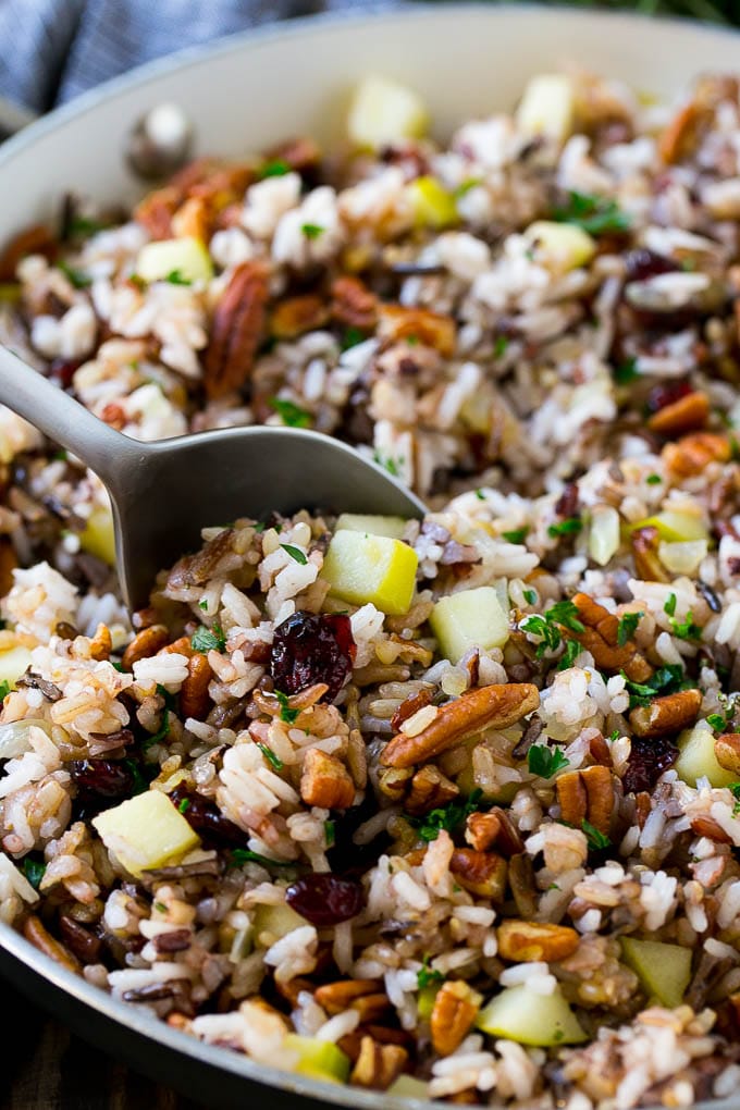 Wild Rice Pilaf Recipe | Thanksgiving Side Dish | Rice Pilaf #rice #apple #cranberry #fall #glutenfree #thanksgiving #jonep A skillet of rice pilaf with apples, cranberries and pecans.