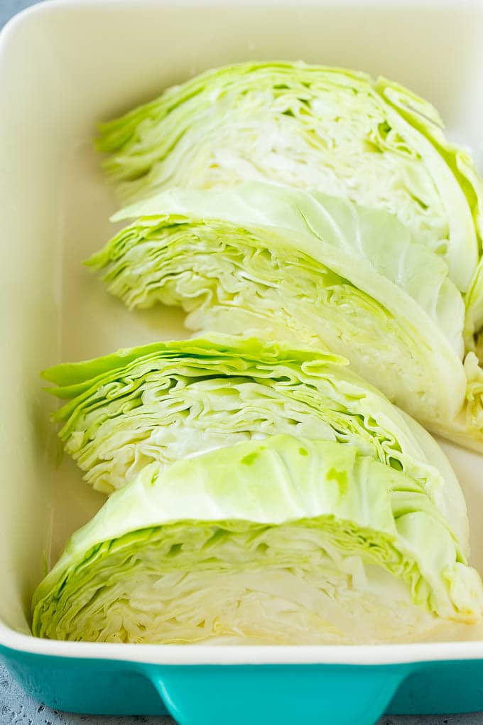 Braised Cabbage Recipe | Easy Cabbage Recipe #cabbage #lowcarb #keto #carrots #veggies #vegetarian #dinner #jonep Wedges of cabbage in a baking dish.