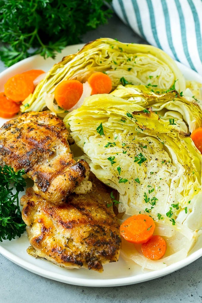 Braised Cabbage Recipe | Easy Cabbage Recipe #cabbage #lowcarb #keto #carrots #veggies #vegetarian #dinner #jonep A plate of grilled chicken along with braised cabbage, carrots and onions.