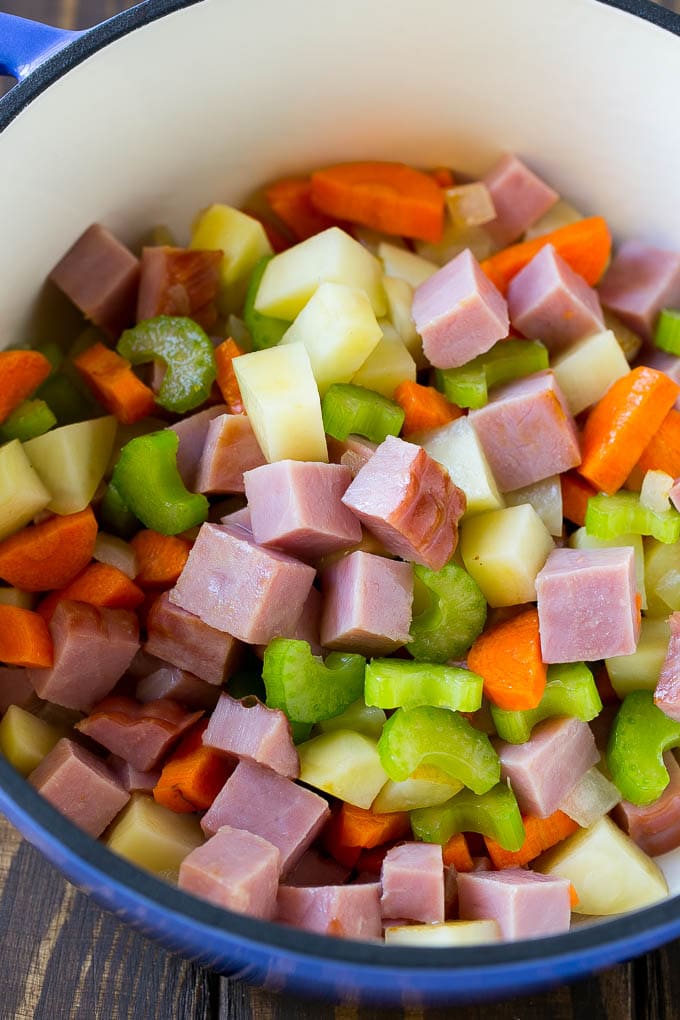 Ham and Potato Soup | Ham Soup | Potato Soup #soup #ham #potato #dinner #comfortfood #jonep Diced ham, carrots, potatoes and celery in a soup pot.