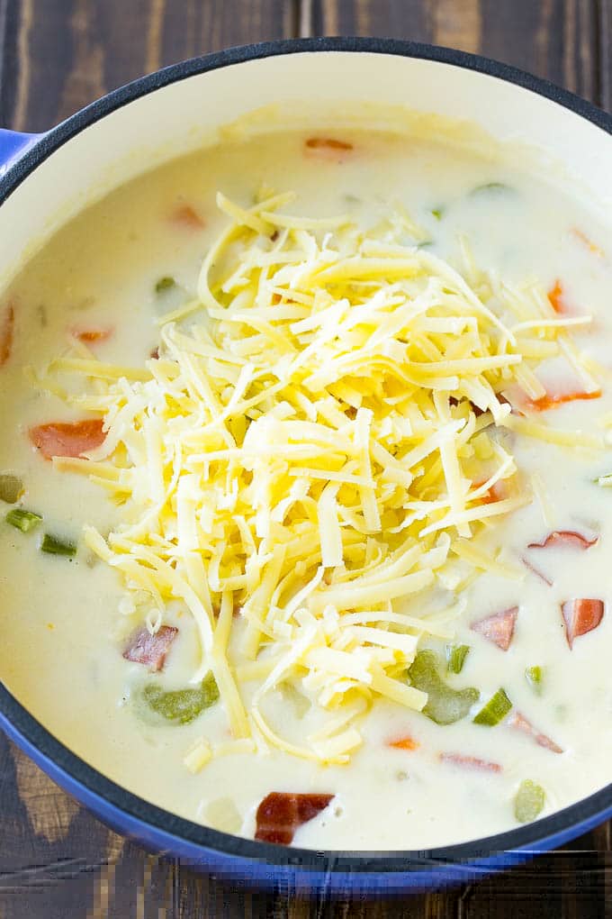 Ham and Potato Soup | Ham Soup | Potato Soup #soup #ham #potato #dinner #comfortfood #jonep Shredded white cheddar cheese to be stirred into ham and potato soup.