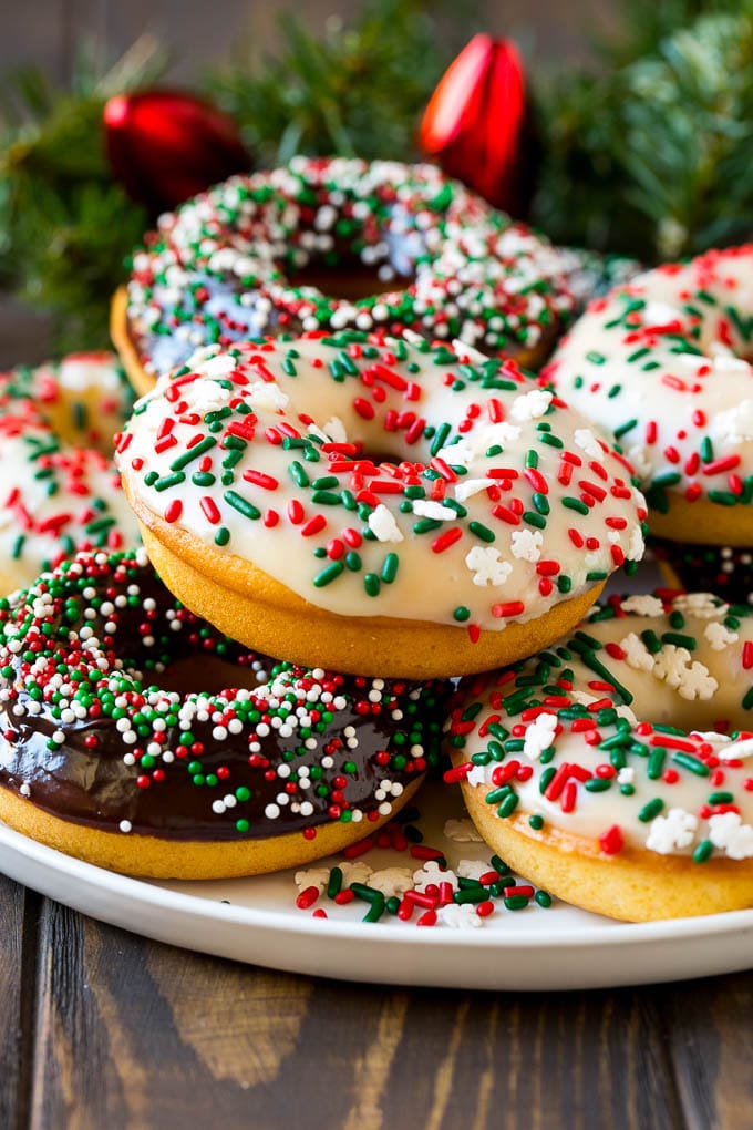 Baked Donuts Recipe | Cake Donuts | Chocolate Donuts | Sprinkle Donuts #donuts #chocolate #sprinkles #breakfast #brunch #jonep Baked donuts topped with chocolate ganache and decorated with holiday sprinkles.