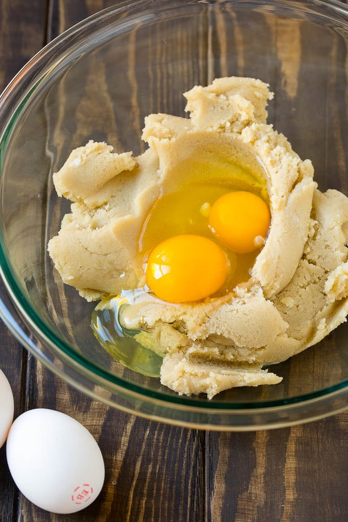 Eggnog Cookies Recipe | Holiday Cookies | Christmas Cookies #cookies #eggnog #baking #christmas #sprinkles #dessert #jonep Butter, sugar and eggs in a mixing bowl.