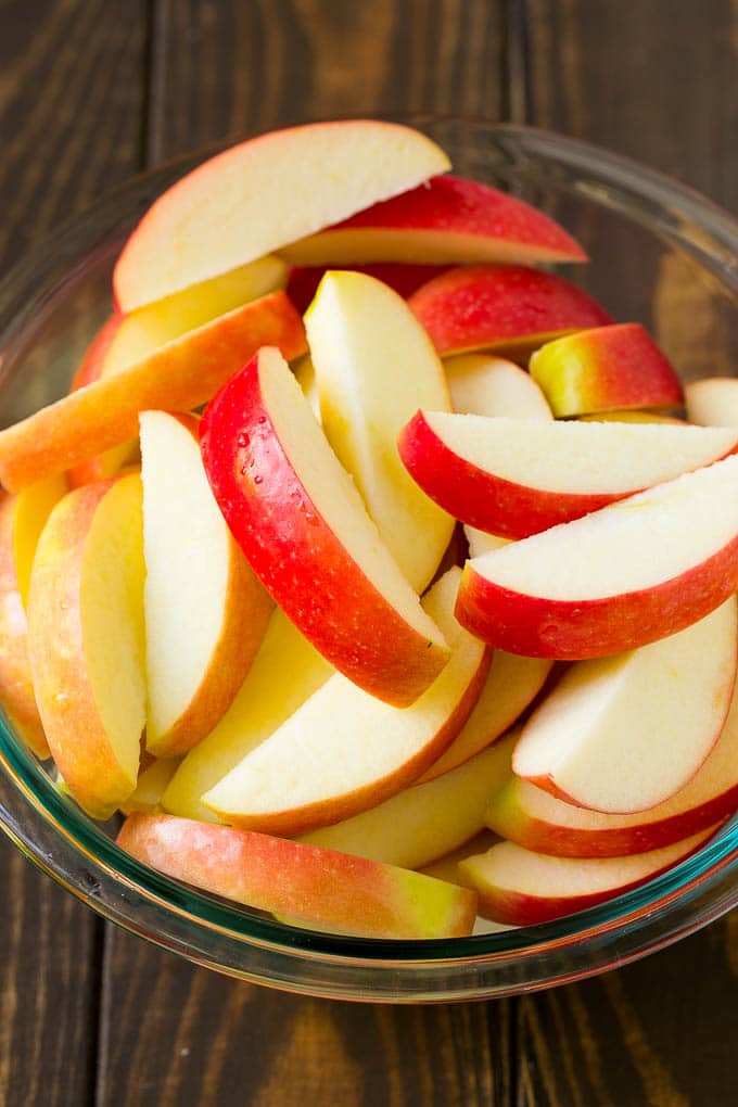 Fried Apples Recipe | Sauteed Apples | Cinnamon Sugar Apples #apples #cinnamon #sugar #sidedish #dessert #jonep #fall Sliced apples in a mixing bowl.