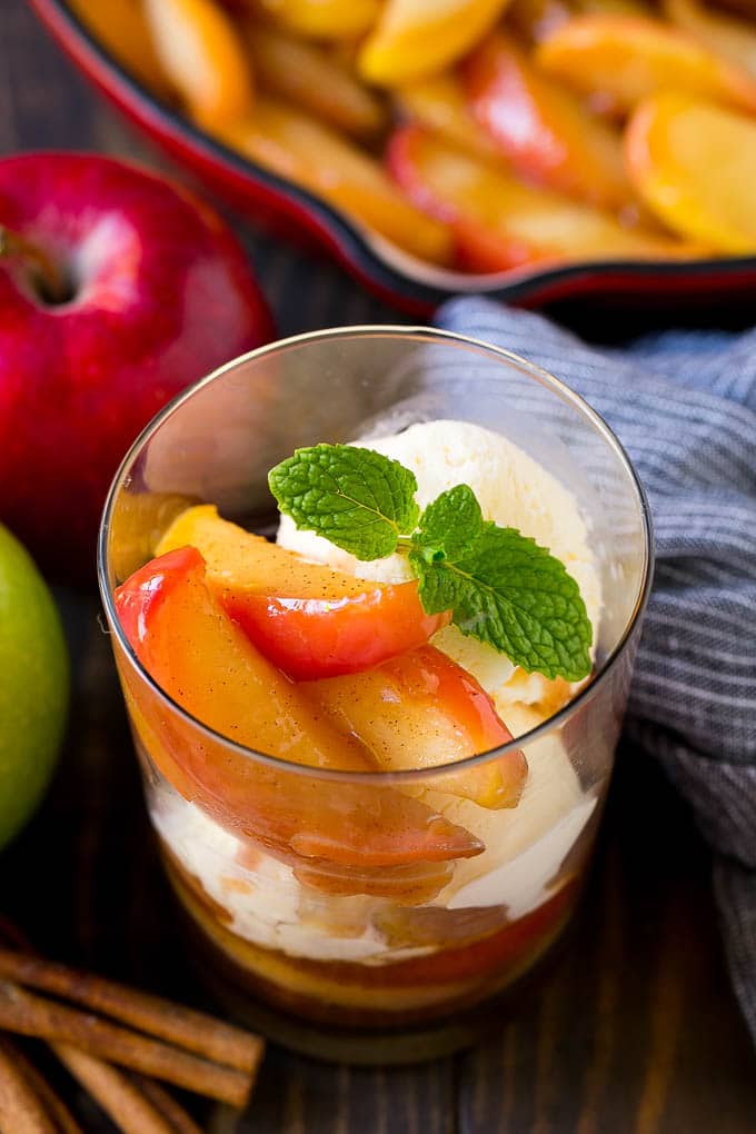 Fried Apples Recipe | Sauteed Apples | Cinnamon Sugar Apples #apples #cinnamon #sugar #sidedish #dessert #jonep #fall A cup of fried apples served with vanilla ice cream and garnished with fresh mint.