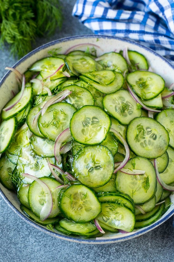 Cucumber Salad Recipe | Cucumber Dill Salad | Cucumber Recipe #cucumbers #salad #glutenfree #sidedish #jonep Cucumber salad in a serving bowl with sliced English cucumbers, red onion and fresh dill.