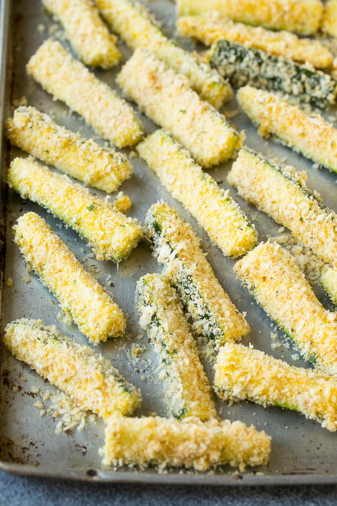 Fried Zucchini Recipe | Zucchini Fries | Zucchini Recipe #appetizer #zucchini #snack #jonep Sticks coated in egg, parmesan and breadcrumbs.