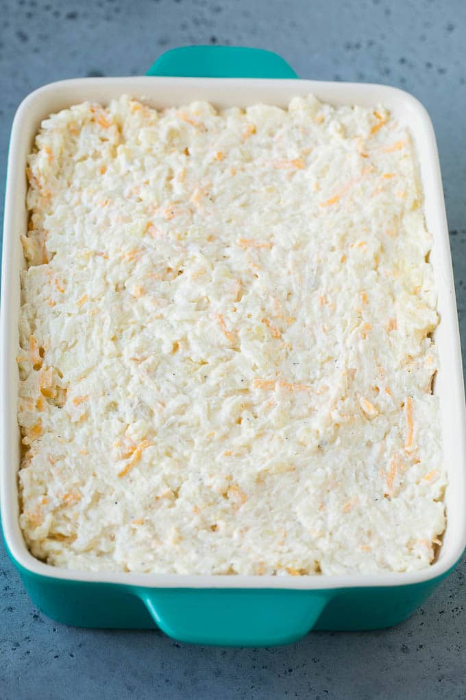 Hash Brown Casserole | Potato Casserole | Hash Brown Side Dish #potatoes #cheese #casserole #sidedish #jonep A mixture of hash browns, sour cream, cheese and seasonings in a casserole dish.