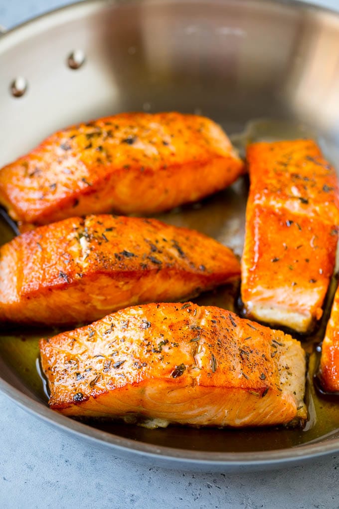 Greek Salmon Salad Recipe | Low Carb Salmon Recipe | Salmon Salad #salmon #seafood #fish #lowcarb #keto #lunch #jonep #healthy Seared fish fillets in a skillet.