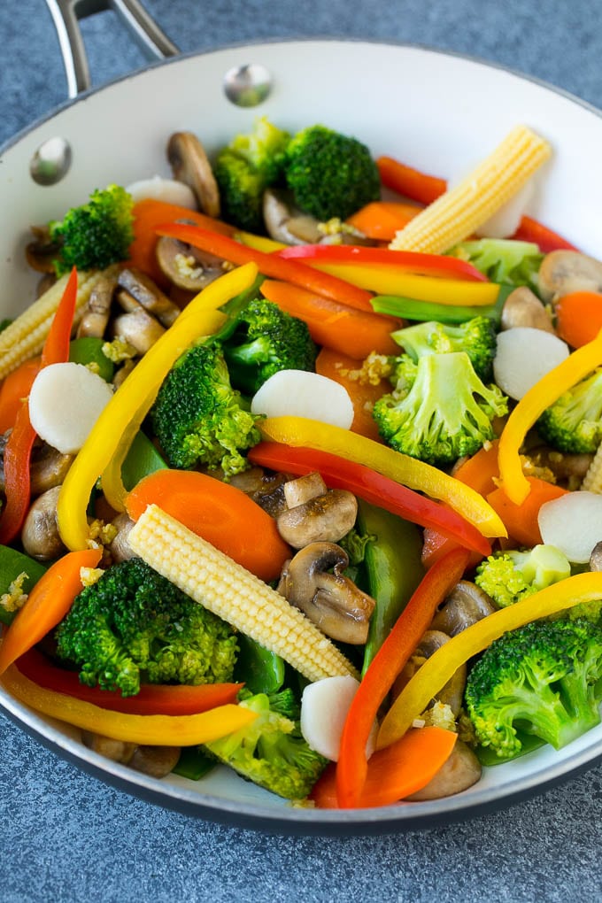 Vegetable Stir Fry Recipe | Veggie Stir Fry | Broccoli Stir Fry #vegetarian #vegetables #broccoli #dinner #jonep A pan of sauteed baby corn, water chestnuts, peppers, broccoli and mushrooms.