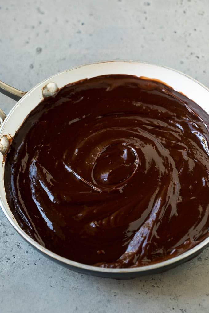 Chocolate Fondue Recipe | Chocolate Sauce | Chocolate Dip #chocolate #dessert #glutenfree #fondue #jonep Melted dip in a skillet.