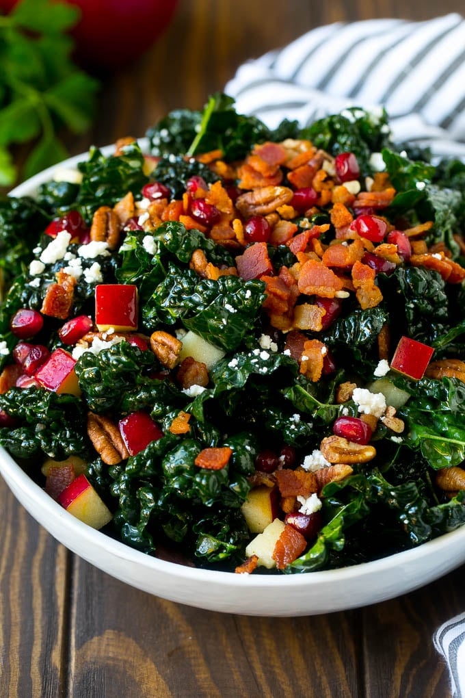 Apple Kale Salad Recipe | Kale Recipe | Fall Salad #kale #apples #bacon #salad #feta #dinner #lunch #jonep Apple kale salad topped with bacon and pecans.
