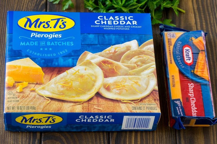Pierogi Casserole Recipe | Potato Casserole #pierogis #casserole #bacon #cheddar #dinner #jonep A box of pierogies and a block of cheddar cheese.