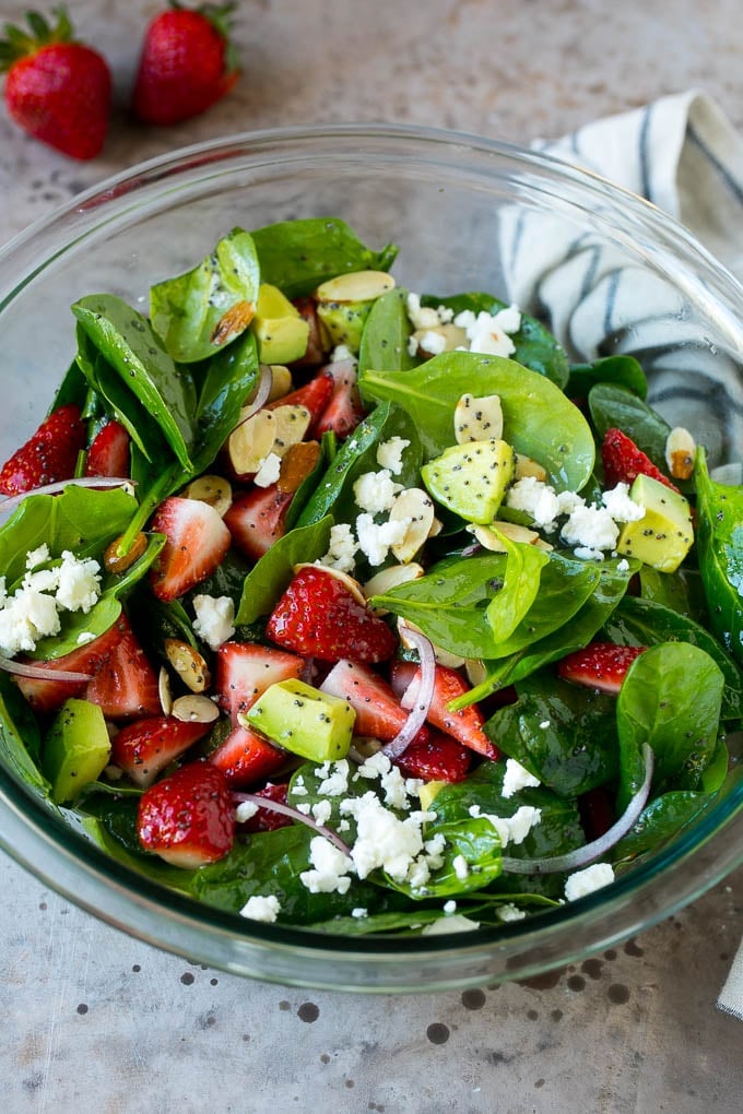 Strawberry Spinach Salad Recipe | Strawberry Salad | Spinach Salad #spinach #salad #strawberries #avocado #jonep A bowl of strawberry spinach salad with feta cheese, almonds and avocado.