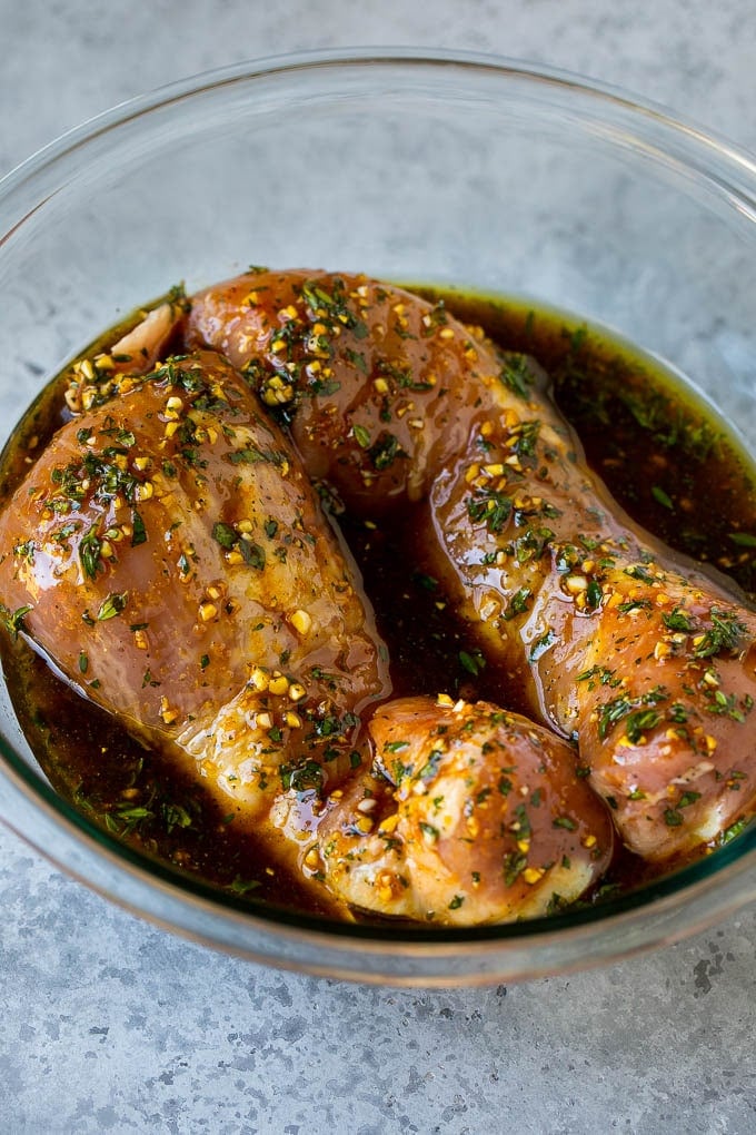 Marinated Pork Tenderloin Recipe | Pork Tenderloin Marinade | Pork Marinade #pork #porktenderloin #marinade #dinner #grilling #jonep Pork tenderloins in a bowl of marinade.