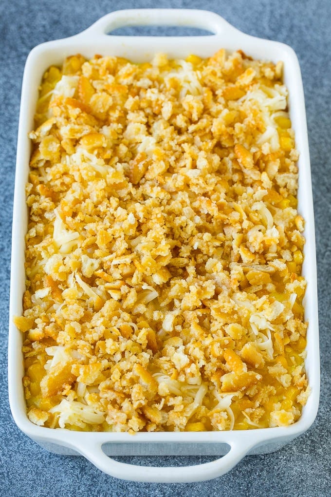 Scalloped Corn | Corn Casserole #corn #casserole #cheese #sidedish #dinner #jonep Scalloped corn topped with crushed crackers and shredded cheese.