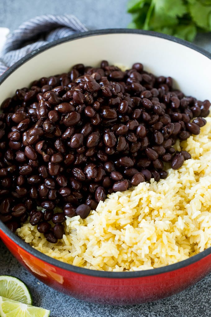 Black Beans and Rice Recipe | Cuban Black Beans | Beans and Rice #beans #rice #blackbeans #sidedish #glutenfree #dinner #jonep Cooked rice and black beans in a pot.