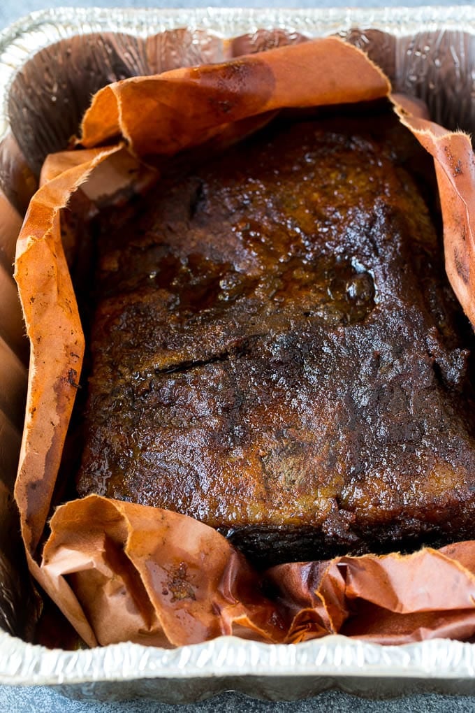 Smoked Brisket Recipe | Beef Brisket | BBQ Beef #brisket #smoker #beef #bbq #dinner #jonep Beef brisket inside butcher paper.