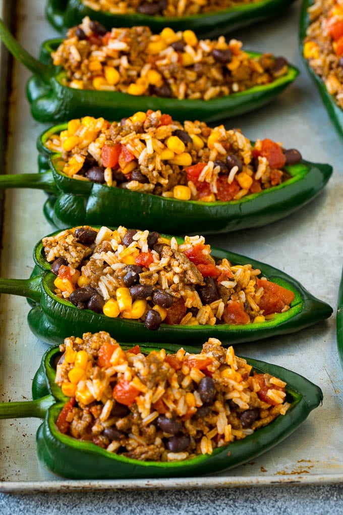 Stuffed Poblano Peppers | Stuffed Peppers | Pasilla Peppers #peppers #stuffedpeppers #beef #rice #beans #corn #dinner #jonep Poblano peppers filled with rice, meat, beans and corn.