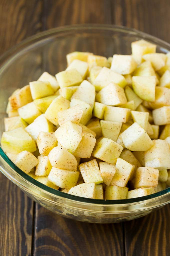 Apple Cobbler Recipe | Apple Dessert #apples #cobbler #dessert #baking #fall #jonep Diced apples tossed with cinnamon and sugar.
