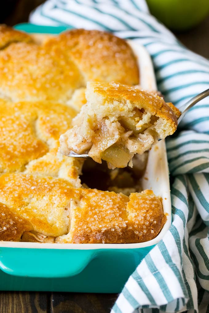 Apple Cobbler Recipe | Apple Dessert #apples #cobbler #dessert #baking #fall #jonep A spoonful of apple cobbler in the serving dish.