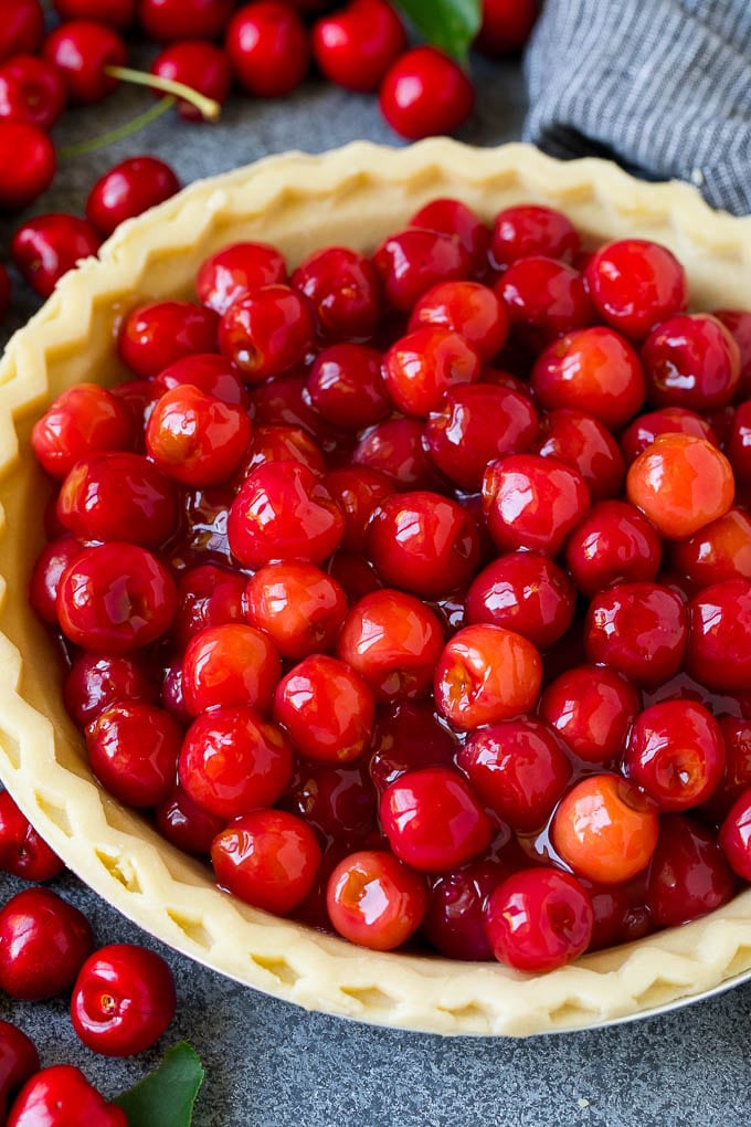 Cherry Pie Filling Recipe #pie #cherries #dessert #sweets #jonep #summer Cherry pie filling inside of an unbaked pie crust.