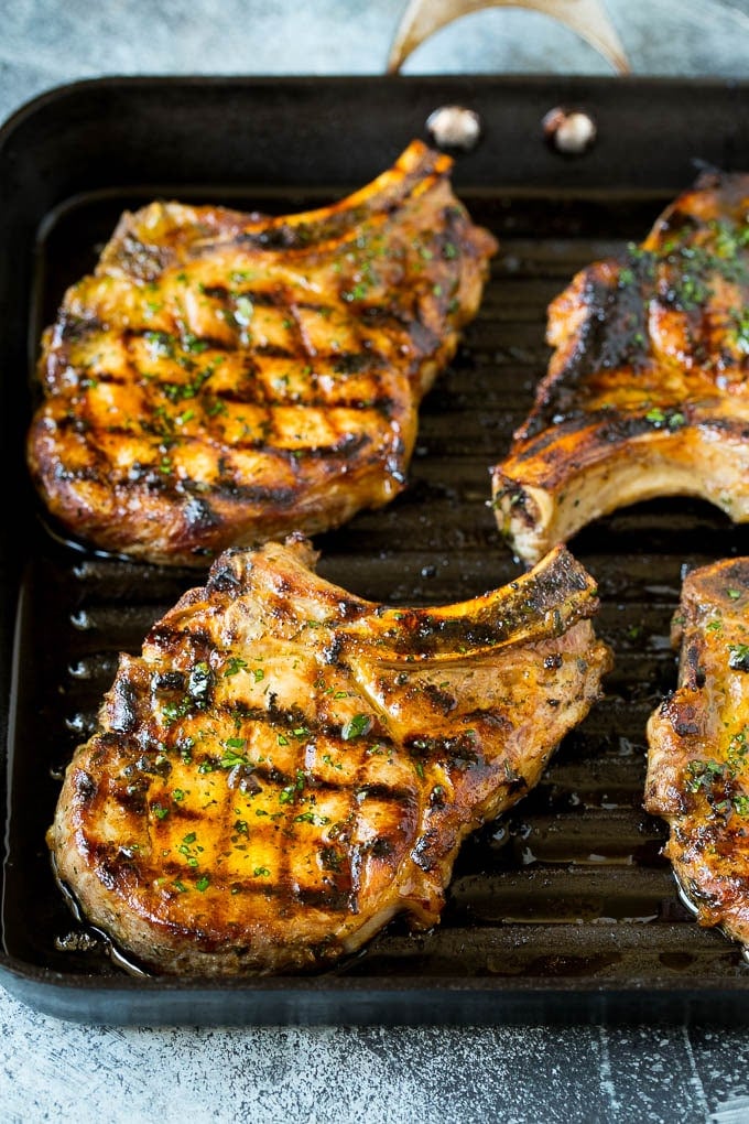 Grilled Pork Chops | Pork Chop Marinade #porkchops #grilling #pork #marinade #dinner #jonep Pork chops on a grill pan.