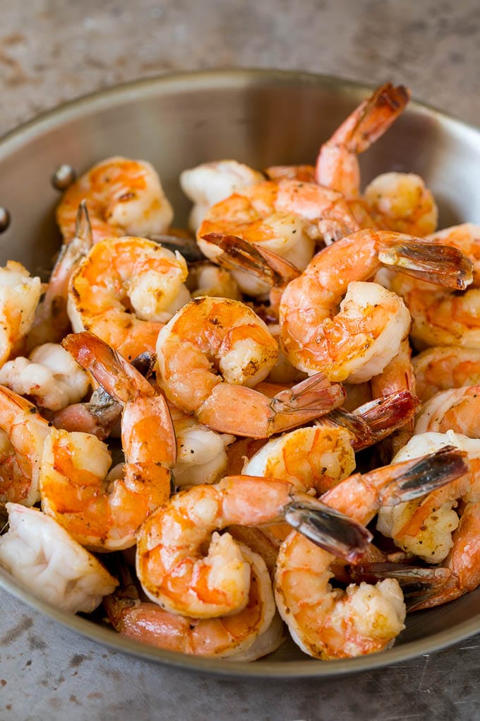Surf and Turf Recipe | Seared Steak #steak #shrimp #keto #lowcarb #dinner #jonep Sauteed jumbo shrimp in a skillet.