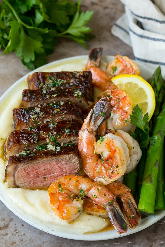 Surf and Turf Recipe | Seared Steak #steak #shrimp #keto #lowcarb #dinner #jonep Surf and turf with steak, shrimp, mashed potatoes and asparagus.