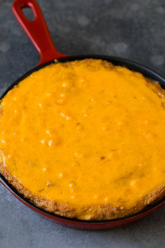 Bean Dip Recipe | Mexican Dip #dip #appetizer #mexicanfood #beans #cheese #jonep Baked refried beans topped with melted cheddar cheese.