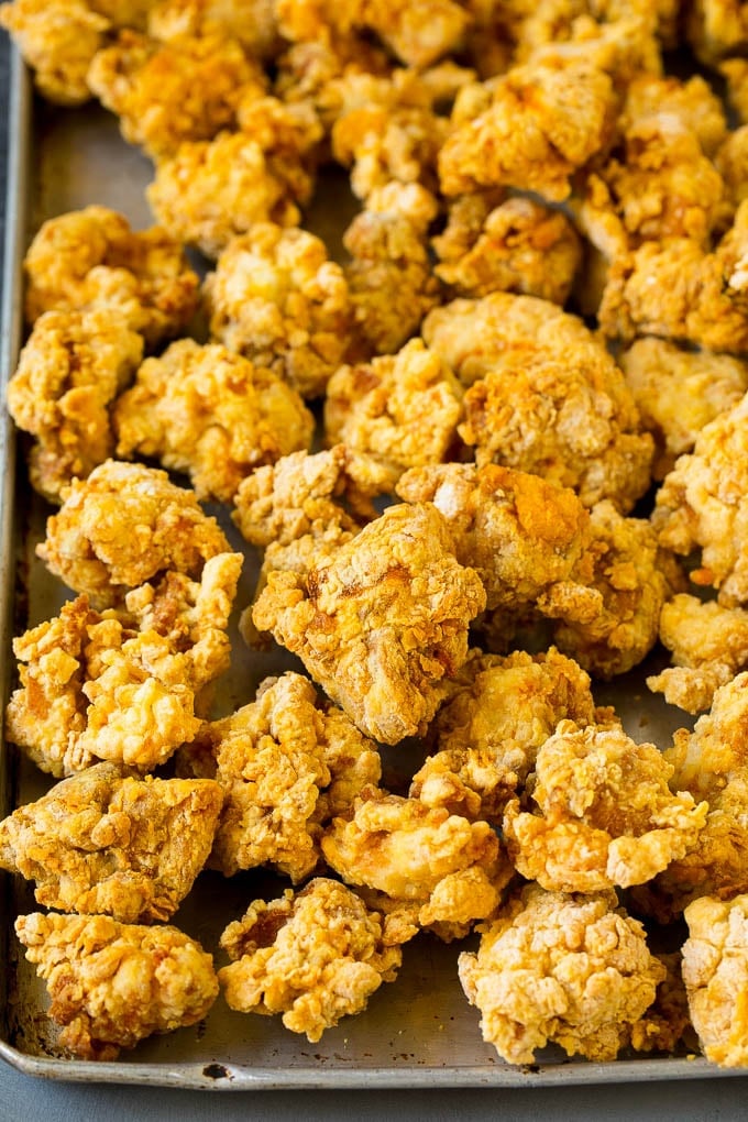 General Tso's Chicken Recipe #chicken #asianfood #dinner #jonep #copycatrecipe Breaded and fried chicken thigh pieces.