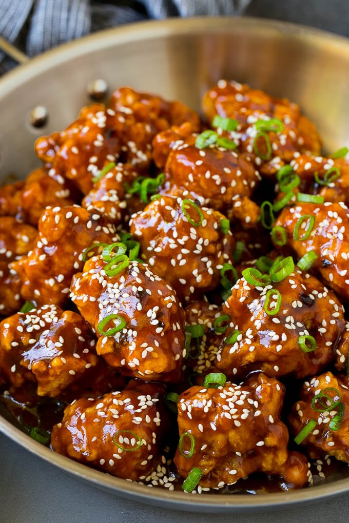 General Tso's Chicken Recipe #chicken #asianfood #dinner #jonep #copycatrecipe General Tso's chicken in a pan coated in a sweet and spicy sauce.