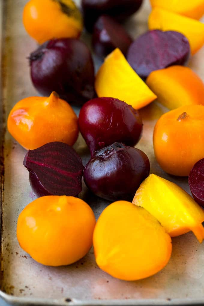 Beet Salad Recipe #beets #avocado #feta #salad #dinner #jonep Roasted red and yellow beets on a sheet pan.