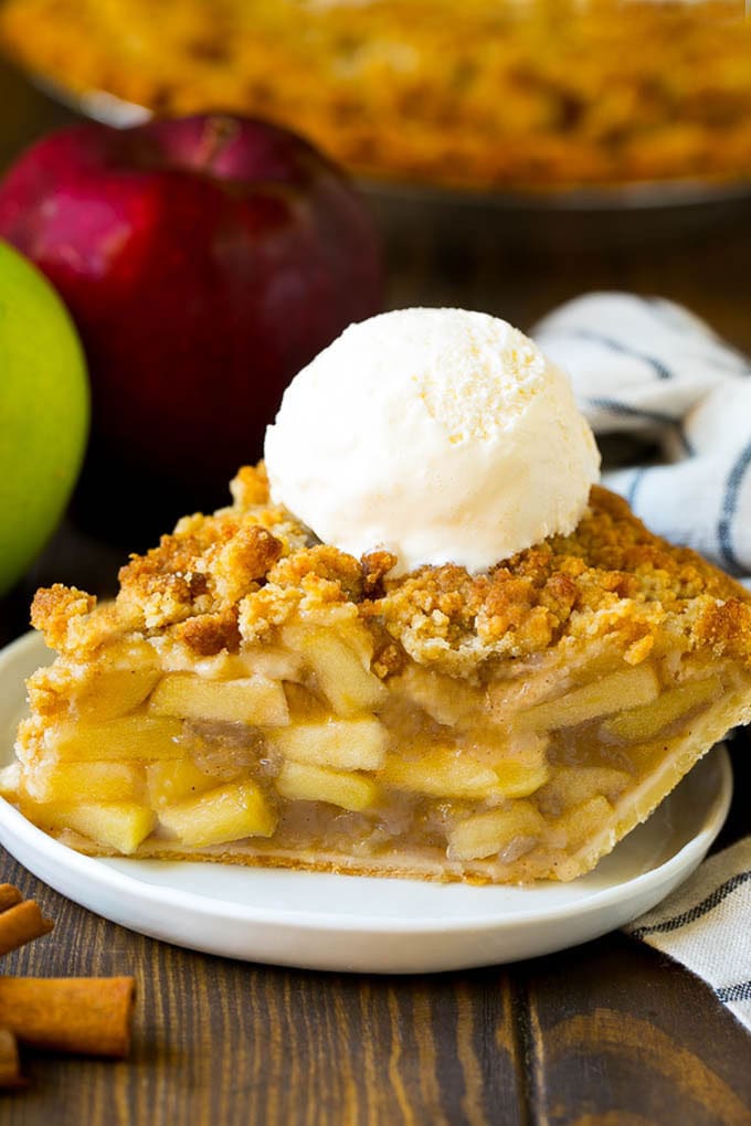 Dutch Apple Pie Recipe | Homemade Apple Pie #pie #apple #dessert #baking #fall #jonep A slice of Dutch apple pie topped with ice cream.