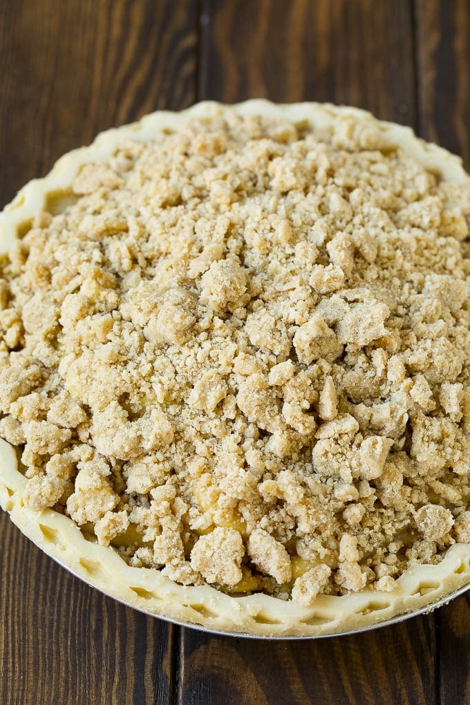 Dutch Apple Pie Recipe | Homemade Apple Pie #pie #apple #dessert #baking #fall #jonep Brown sugar topping on top of an unbaked pie.