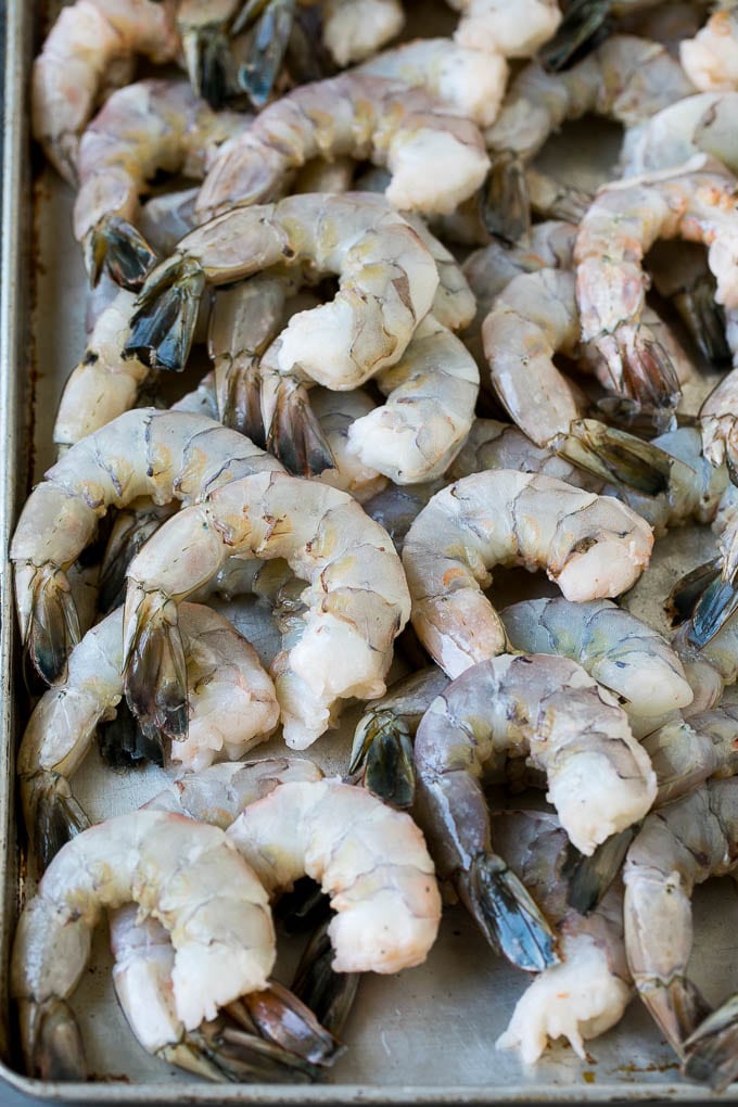 Fried Shrimp Recipe #shrimp #seafood #dinner #appetizer #jonep Raw shrimp on a sheet pan.
