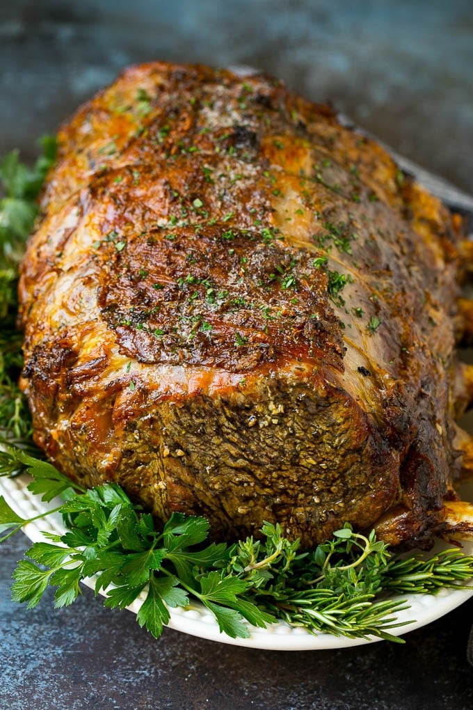 Prime Rib Recipe #primerib #beef #roast #dinner #thanksgiving #christmas #keto #lowcarb #jonep A slow roasted prime rib on a serving platter.